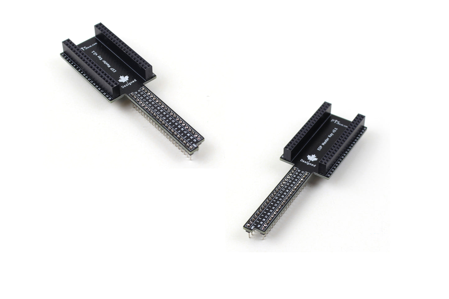 Two fully assembled PTSolns ESP Master Key breakout boards placed side by side on a plain background, showing headers soldered on both boards.
