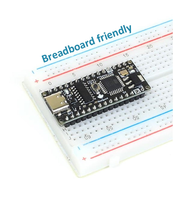 PTSolns Nano Flip microcontroller development board inserted into a standard breadboard, demonstrating its compact, breadboard-friendly design ideal for rapid prototyping and circuit experimentation